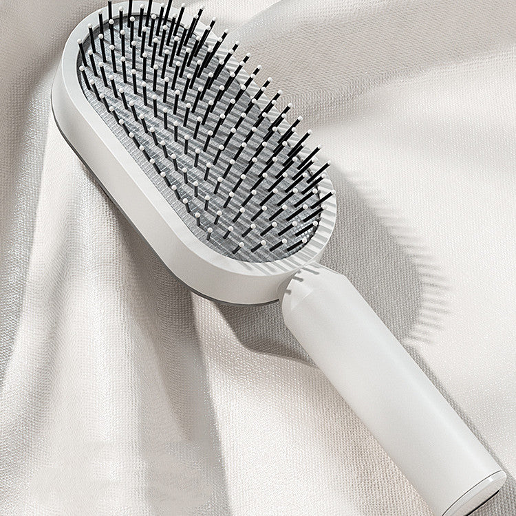 Self cleaning hair brush