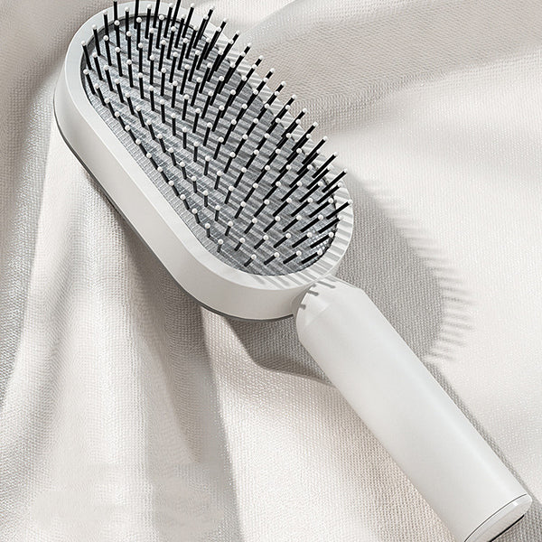 Self cleaning hair brush