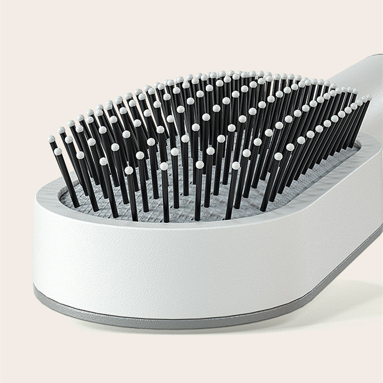 Self cleaning hair brush